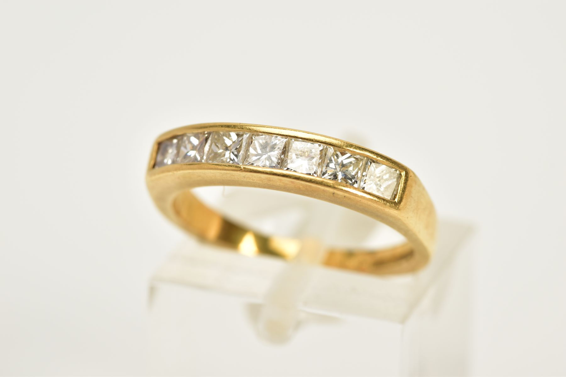 A MODERN 8CT YELLOW GOLD DIAMOND HALF ETERNITY RING, estimated princess cut diamond weight 0.77ct,