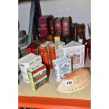 A COLLECTION OF MONEY BOXES, ETC, including a pottery 'Polperro Pasty Bank', two Royal Doulton