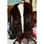 A LADIES DARK BROWN MINK AND LEATHER JACKET, by Giddings Furs of Harrow, with shawl collar,