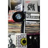 TWO SINGLES CASES CONTAINING OVER NINETY MOSTLY PUNK AND 1980'S 7'' SINGLES, including Jimmy Jimmy