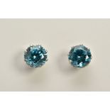 A PAIR OF BLUE ZIRCON SINGLE STONE STUD EARRINGS, circular cut blue zircons measuring