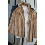 A LADIES LIGHT BEIGE MINK JACKET, with side pockets, measuring across back underarm to underarm 57cm