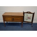 AN EARLY TO MID 20TH CENTURY GOLDEN OAK TWO DOOR WASHSTAND, together with an oak firescreen (2)