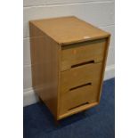 JOHN AND SYLVIA REID FOR STAG, a golden oak three drawer bedside chest (sd and alteration)