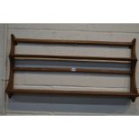 AN ERCOL GOLDEN DAWN HANGING PLATE RACK