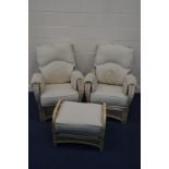 A CONSERVATORY THREE PIECE SUITE, with cream cushions, comprising two armchairs and a pouffe (sd) (