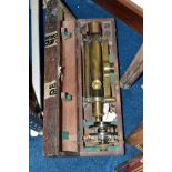 A CASED BRASS TROUGHTON & SIMMS OF LONDON THEODOLITE, the case fitted with two further lenses and