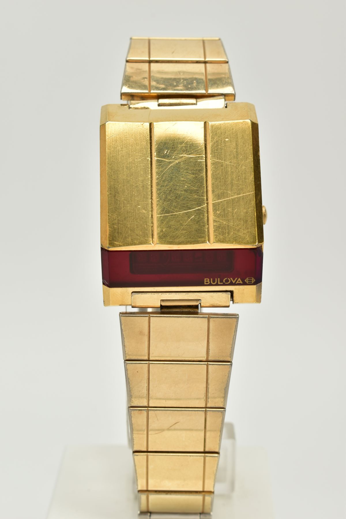 A GENTS BULOVA LED WRISTWATCH, the rectangular case with a red glass digital display signed '