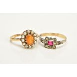 TWO CLUSTER RINGS, the first designed with a central oval cut orange stone assessed as citrine,
