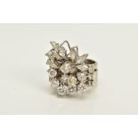 AN 18CT WHITE GOLD INTERLOCKING DIAMOND CLUSTER RING, the principle ring set with an open work