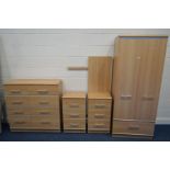 A MODERN BEECH FIVE PIECE BEDROOM SUITE, comprising a two door wardrobe above a single drawer, width