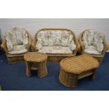 A WICKER FIVE PIECE CONSERVATORY SUITE, with floral cushions, comprising a two seater settee, pair