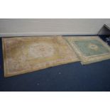 TWO VARIOUS CHINESE RUGS, one in green and the other gold, largest carpet size, 259cm x 169cm (