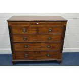 A GEORGIAN MAHOGANY CHEST OF TWO SHORT OVER THREE LONG DRAWERS, with three secret frieze drawers,