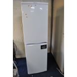 A HOTPOINT FRIDGE FREEZER 174cm high x 55cm wide (PAT pass and working @1 and -20 degrees(