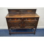AN EARLY TO MID 20TH CENTURY OAK GEOMETRIC SIDEBOARD, with a raised back, two drawers above double