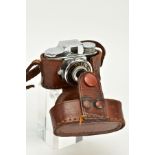 A MINIATURE LEATHER CASED MYCRO CAMERA, lens signed 'Mycro UNA 1.45 F=20mm, accompanied with