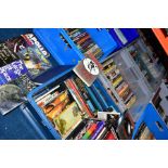 SEVEN PLASTIC BOXES OF BOOKS, to include Astronomy and Space related topics, paperbacks,