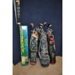 THREE GOLF BAGS WITH CLUBS, a boxed practice net and a pole, clubs include a Calloway Big Bertha,