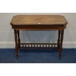 AN EDWARDIAN WALNUT RECTANGULAR CARD TABLE, the top with canted corners, fold over top enclosing a