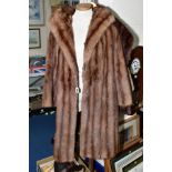 A LADIES CONEY FUR COAT, with shawl collar, side pockets, approximate size 12 (shorter sleeves),
