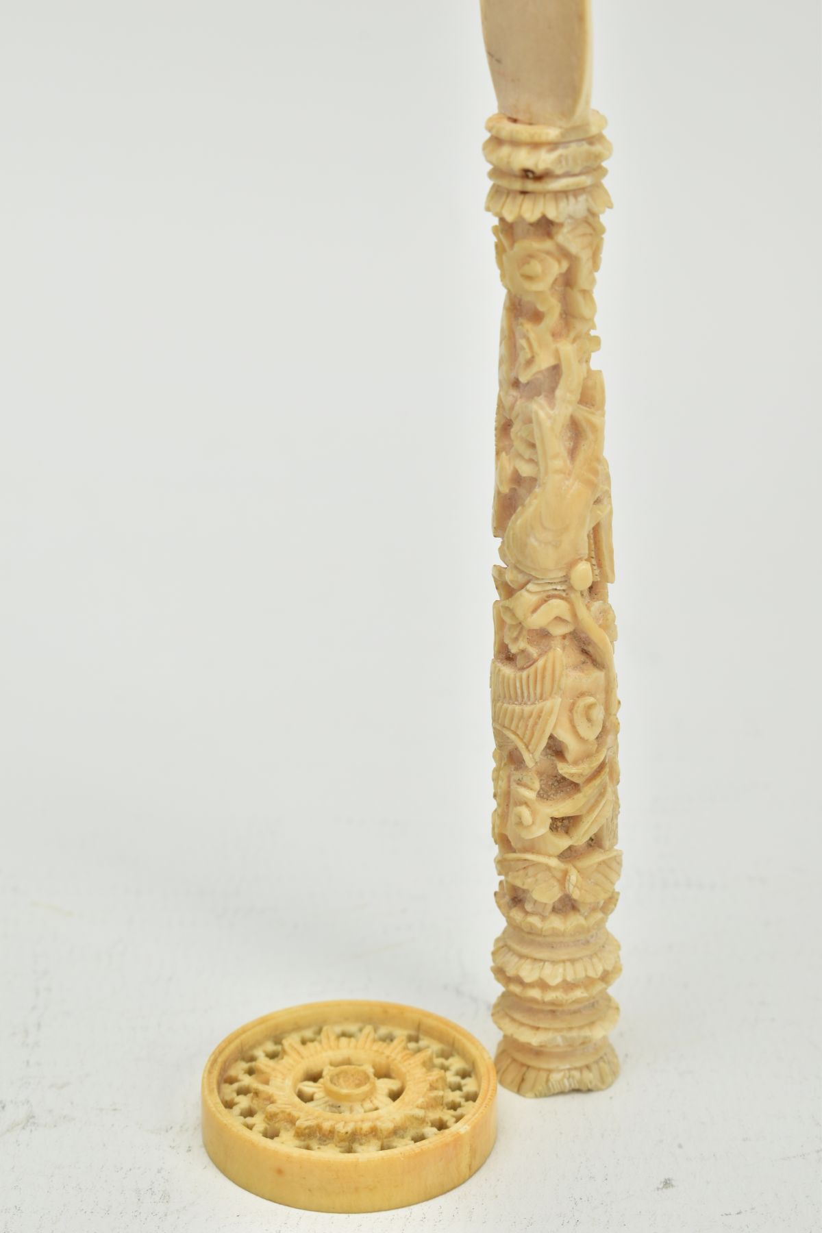 A 19TH CENTURY CARVED IVORY FIGURE OF A SCANTILY CLAD FEMALE WITH A BIRD AND PIPES, mounted on a - Image 9 of 9