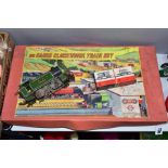 A BOXED BRIMTOY OO GAUGE TINPLATE CLOCKWORK TRAIN SET, No.4044, comprising streamlined 0-4-0