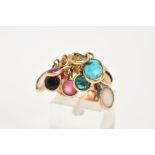 A YELLOW METAL MULTI-GEMSTONE RING, the plain polished wide shank, suspends nine drops containing