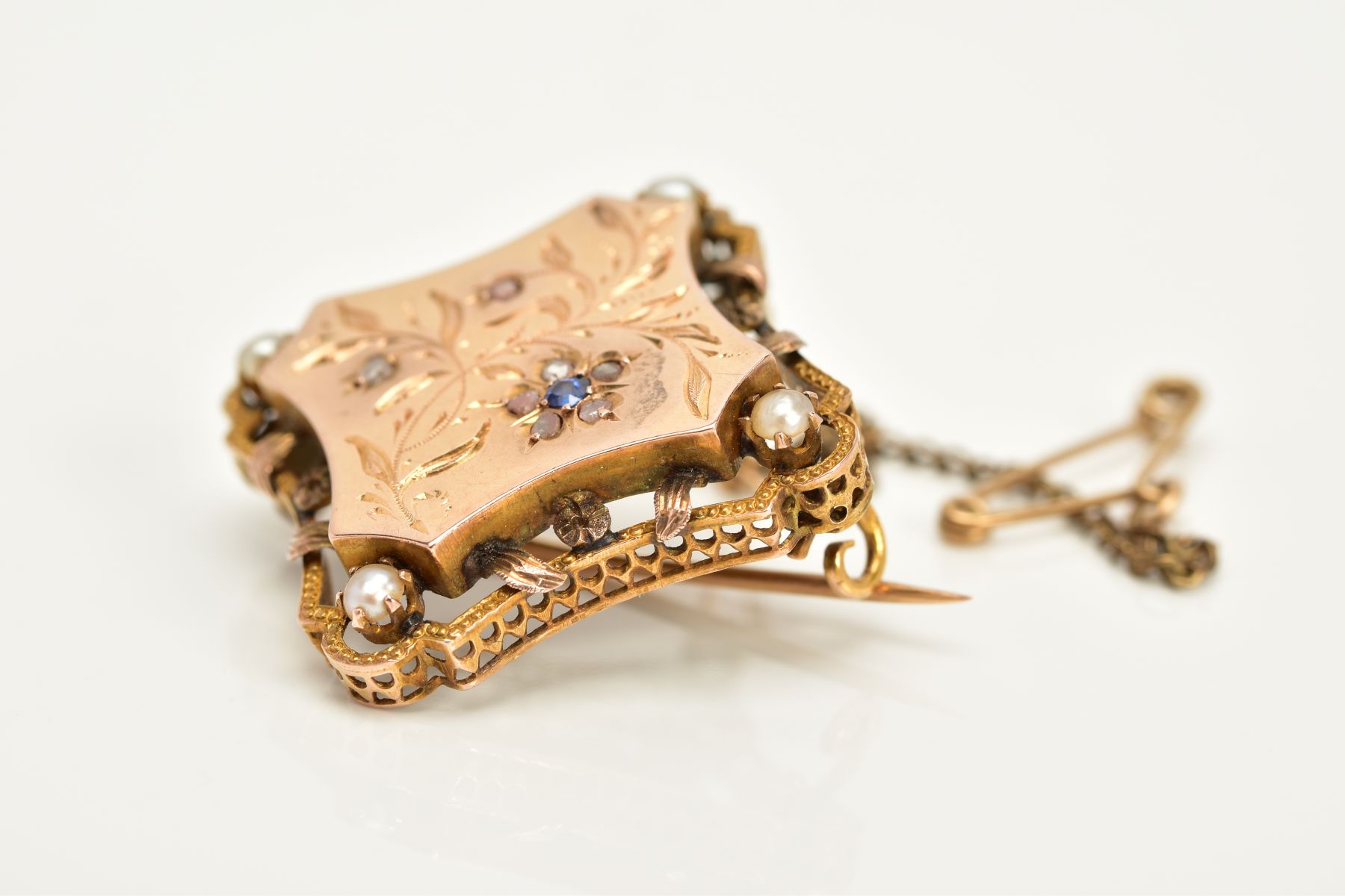 AN EARLY 20TH CENTURY GOLD SAPPHIRE, ROSE CUT DIAMOND AND PEARL BROOCH, engraved with a foliate - Image 3 of 4