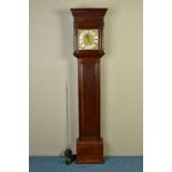 AN EARLY 18TH CENTURY OAK LONGCASE CLOCK, the hood with moulded pediment, arched glazed side panels,