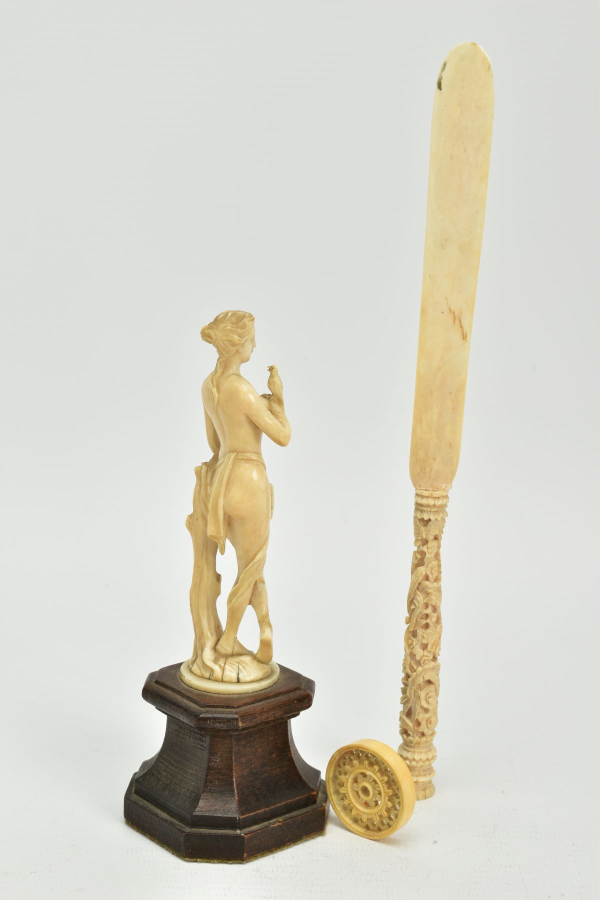 A 19TH CENTURY CARVED IVORY FIGURE OF A SCANTILY CLAD FEMALE WITH A BIRD AND PIPES, mounted on a - Image 4 of 9