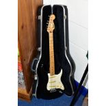A 1998 FENDER STRATOCASTER, Mexican made with a one piece Maple neck with 'Skunk' stripe, 21