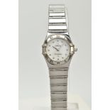 A LADY'S CASED OMEGA CONSTELLATION WRISTWATCH, designed with a round mother of pearl dial signed '