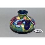 A SMALL MOORCROFT POTTERY SQUAT VASE, 'Orchid' pattern on green ground, impressed and painted
