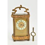 A SMALL BRASS GLASS SIDED CARRIAGE CLOCK, brass front signed L.N. Hobday, Birmingham, enamel