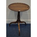 A GEORGIAN MAHOGANY DISH TILT TOP TRIPOD TABLE, on a turned support, diameter 56cm x height 74cm