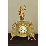 A LATE 19TH CENTURY GREEN ONYX AND GILT METAL FIGURAL MANTEL CLOCK, the enamel dial (hairlined