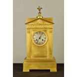 A MID 19TH CENTURY ORMOLU MANTEL CLOCK OF ARCHITECTURAL FORM, the rectangular top with dove finial