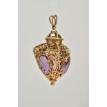 A 9CT GOLD AMETHYST LANTERN FOB, the openwork scroll detailed, lantern design fob, three sides