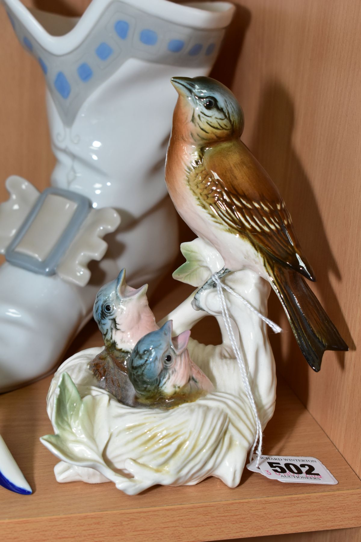 A KARL ENS VOLKSTEDT-RUDOLSTADT PORCELAIN FIGURE GROUP, depicting bird feeding chicks in a nest, - Image 2 of 4