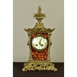 A LATE 19TH CENTURY BRASS AND TORTOISESHELL FRENCH MANTEL CLOCK, flaming urn finial above a