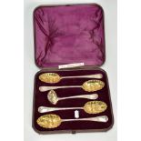 A CASED SET OF SILVER GEORGEIAN SPOONS, to include four tablespoons, each with an embossed fruit