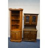 A GOLDEN OAK OPEN CORNER CUPBOARD, with a single drawer, width 85cm x depth 57cm x height 212cm