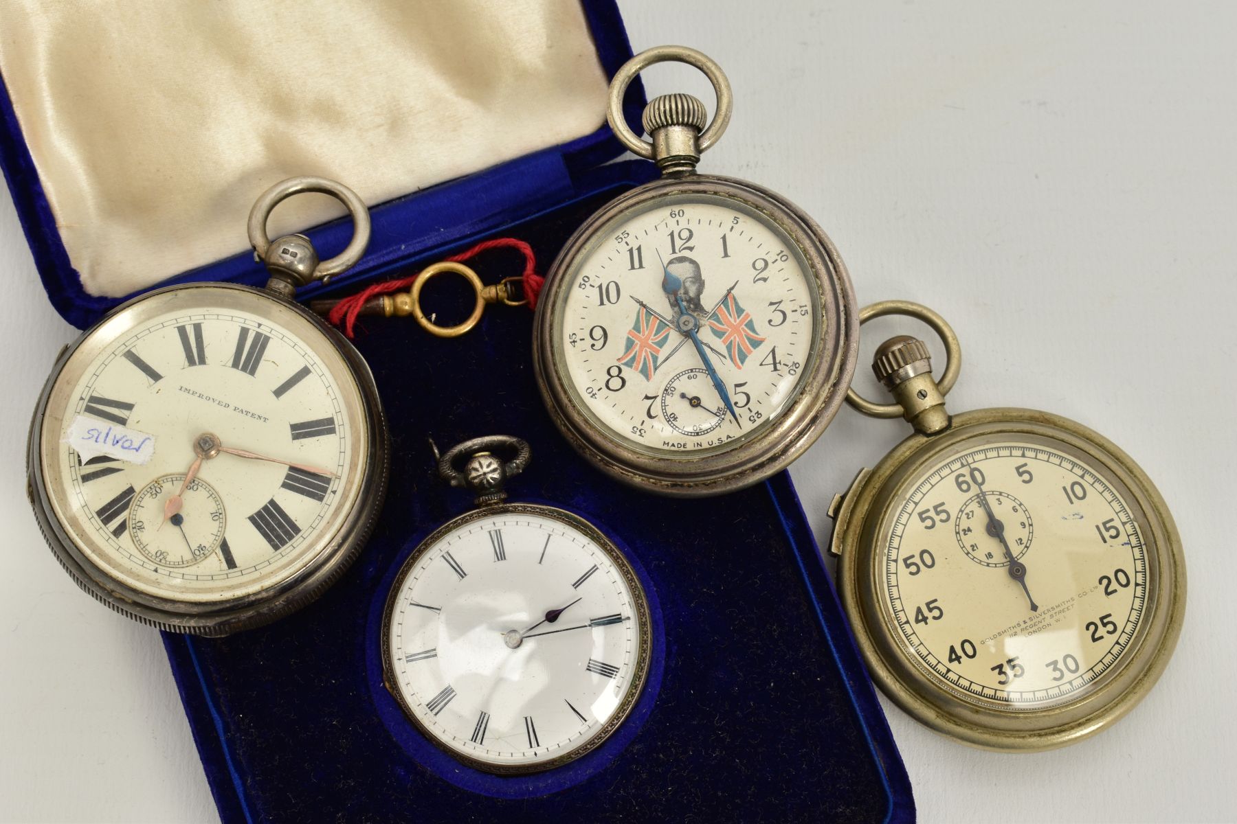 THREE POCKET WATCHES AND A STOP WATCH, to include a silver open faced watch, white dial, Roman