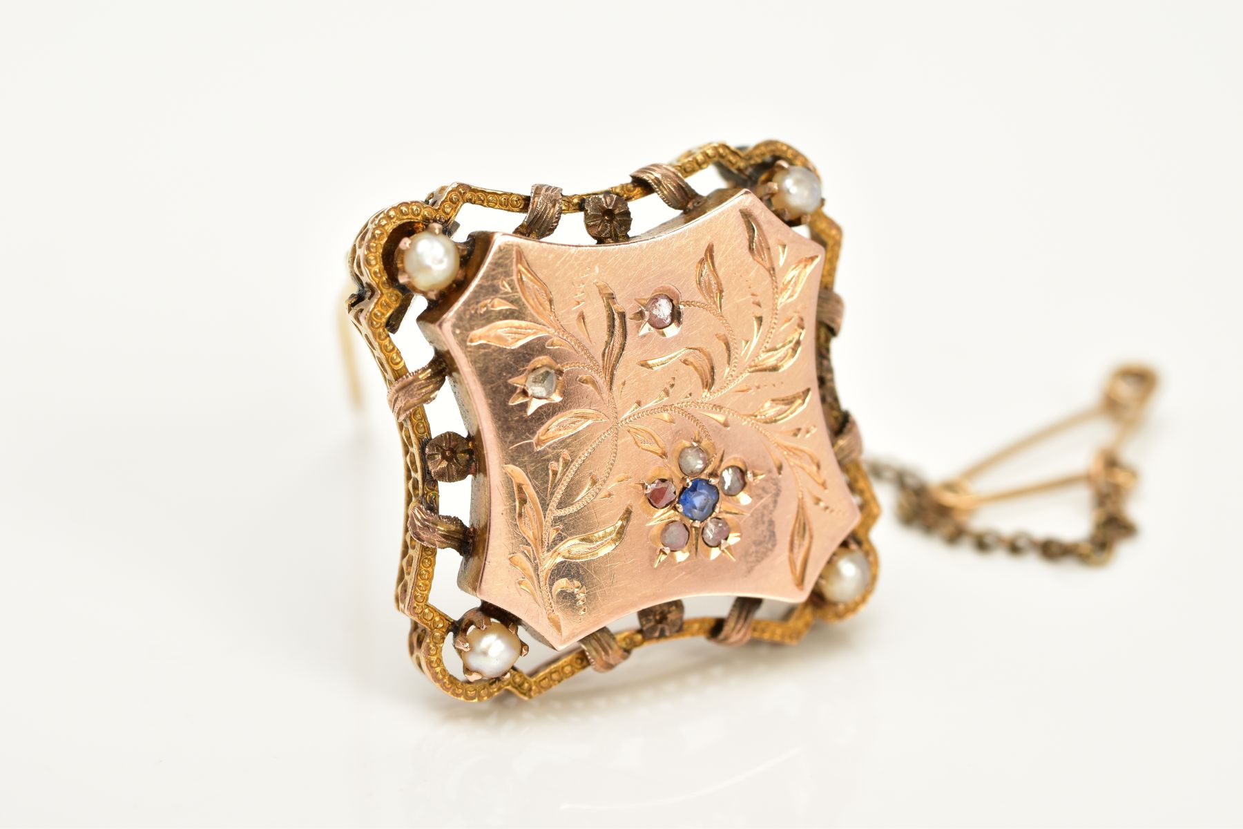 AN EARLY 20TH CENTURY GOLD SAPPHIRE, ROSE CUT DIAMOND AND PEARL BROOCH, engraved with a foliate - Image 2 of 4