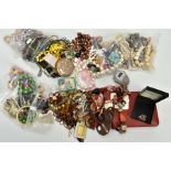 A LARGE QUANTITY OF COSTUME JEWELLERY, to include various designs and bead necklaces, simulated