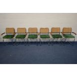 A SET OF SIX 1970'S/80'S TUBULAR AND WOODEN FRAMED ARMCHAIRS, with a cane back and green upholstered