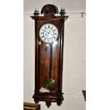 A MID 19TH CENTURY WALNUT AND STAINED CASED VIENNA REGULATOR WALL CLOCK, turned finials flanking