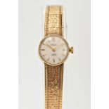 A MID TO LATE 20TH CENTURY 9CT GOLD TALIS LADIES WRISTWATCH, an oval case measuring 23mm x 18.5mm,