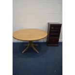 A SOLID OAK CIRCULAR PEDESTAL DINING TABLE, diameter 140cm x height 80cm and a mahogany hi fi